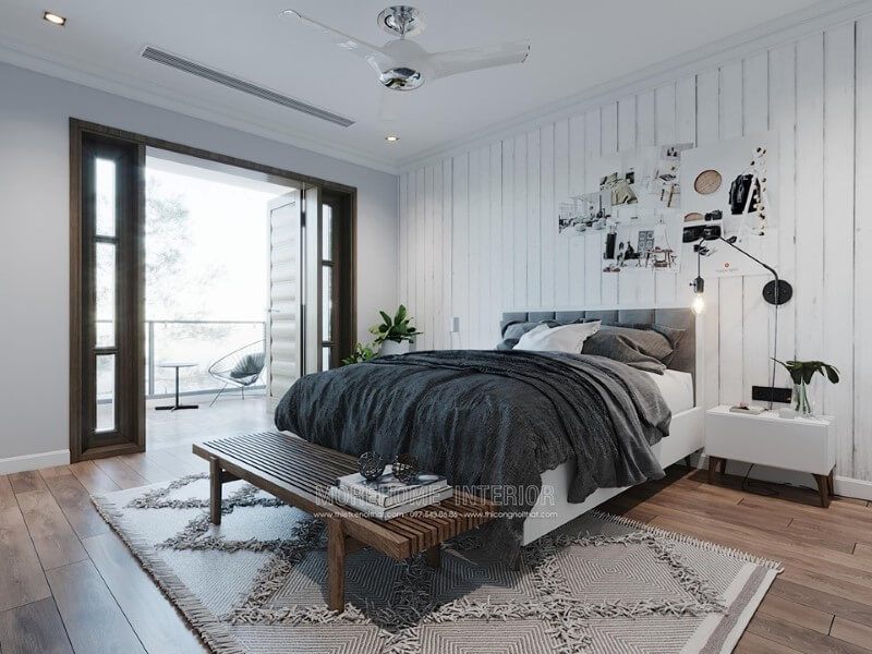 Chọn giấy dán tường với mẫu vân kẻ sọc để tạo nên diện tích và thẩm mỹ hơn cho phòng ngủ so với một bức tường thô cứng.
